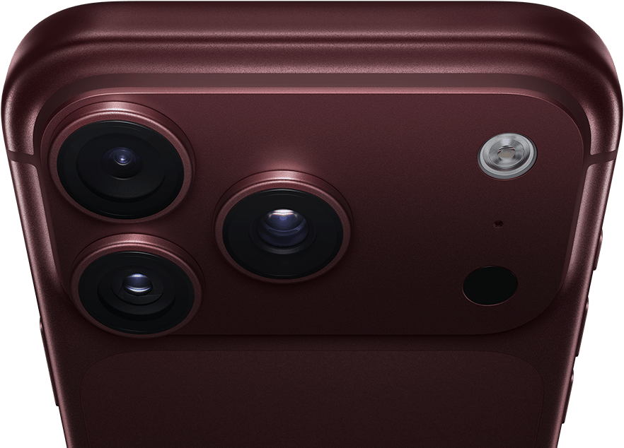 جهاز iPhone&nbsp;18&nbsp;Pro&nbsp;Max، بلون عنّابي (أحمر داكن)، الجهة الخارجية الخلفية، نظام كاميرات Pro&nbsp;Fusion في الأعلى، 3 عدسات، شفرات فتحة عدسة متغيرة مغلقة جزئياً، فلاش، ميكروفون وماسح ضوئي بتكنولوجيا لايدار، الجهة الخارجية العلوية، هوائي خلوي، جوانب مسطحة، حواف مدورة
